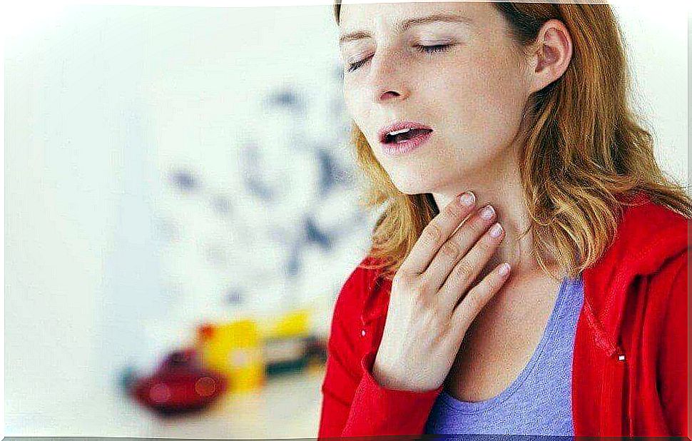 woman with sore throat