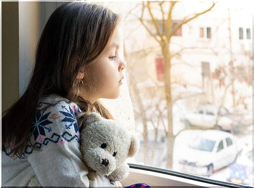 girl looking out the window