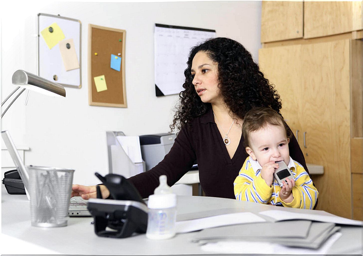 super mom working with son