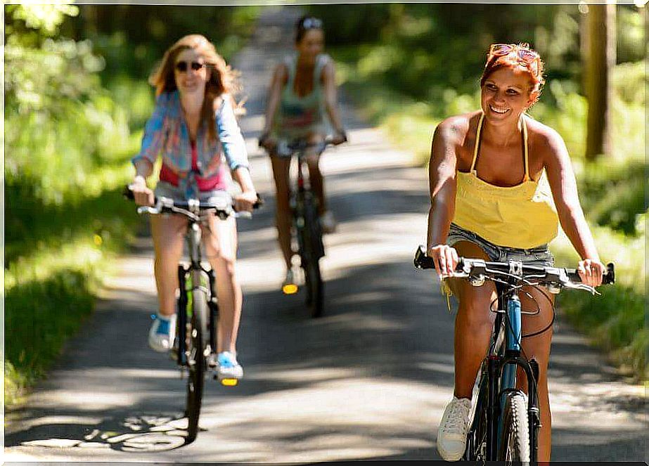 women riding bicycles