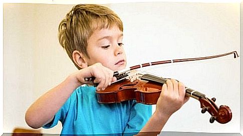 child playing a musical instrument