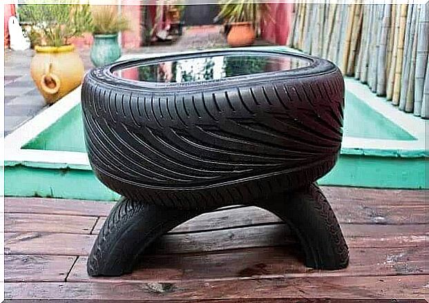 You can use an old tire to make a little table