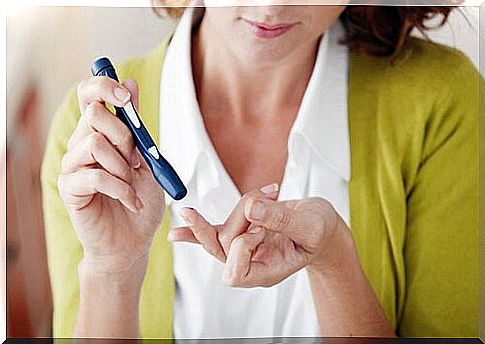 Woman measuring glucose levels