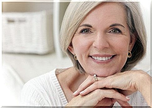 Beautiful smiling woman in menopause.