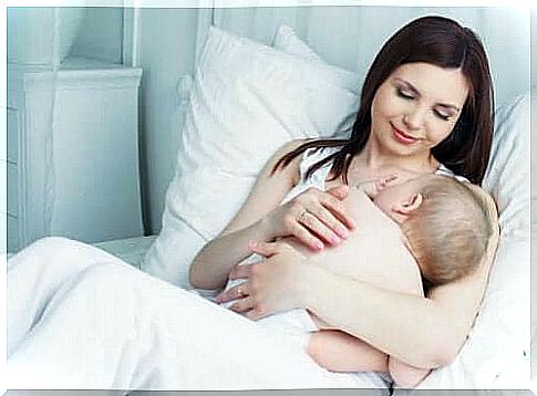 mother breastfeeding her child