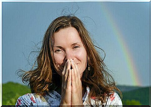 happy woman with rainbow 